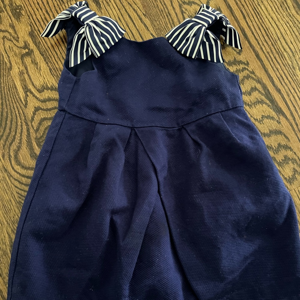 Adorable bow trim sleeveless dress